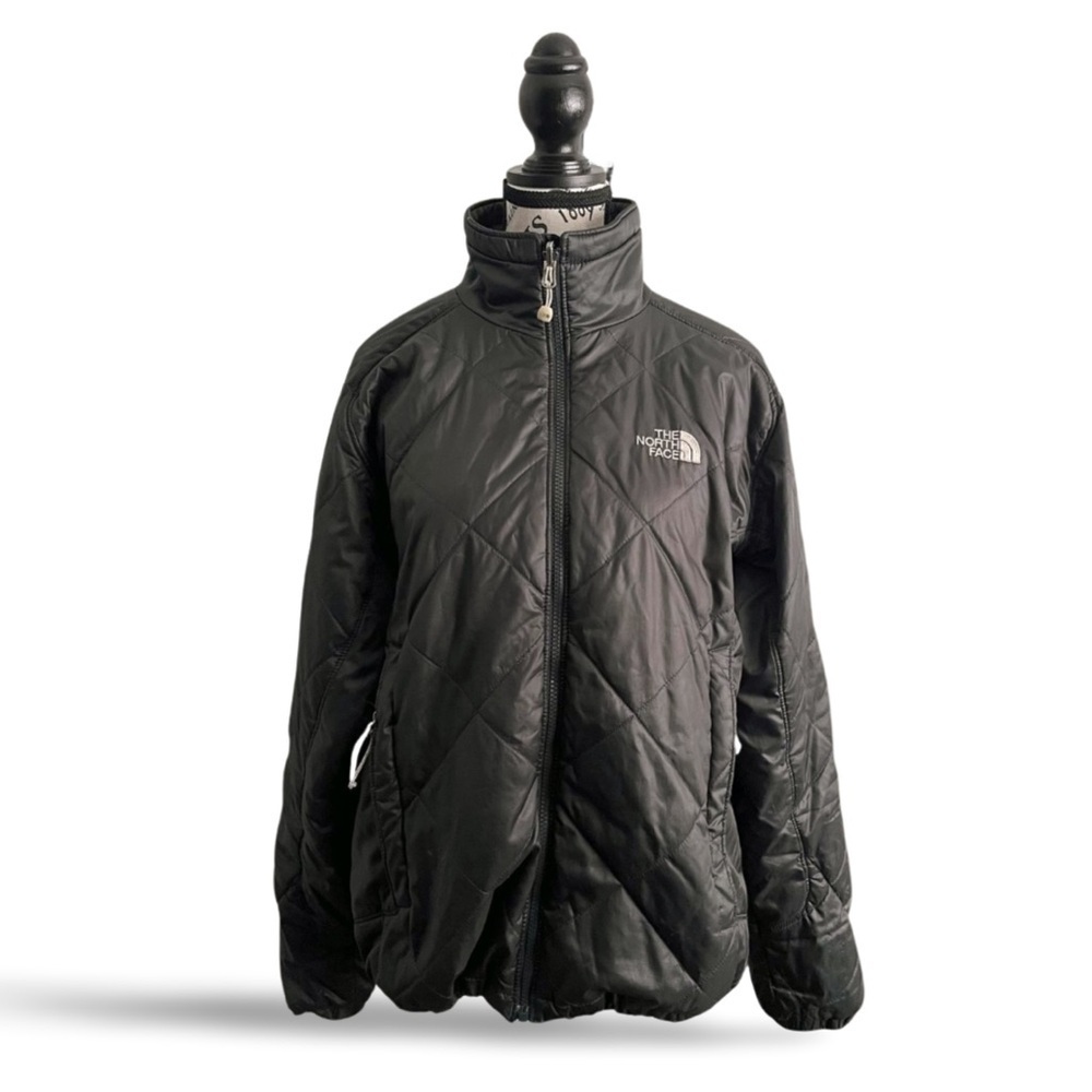 The North Face Black Quilted Zip Jacket
Women’s Large